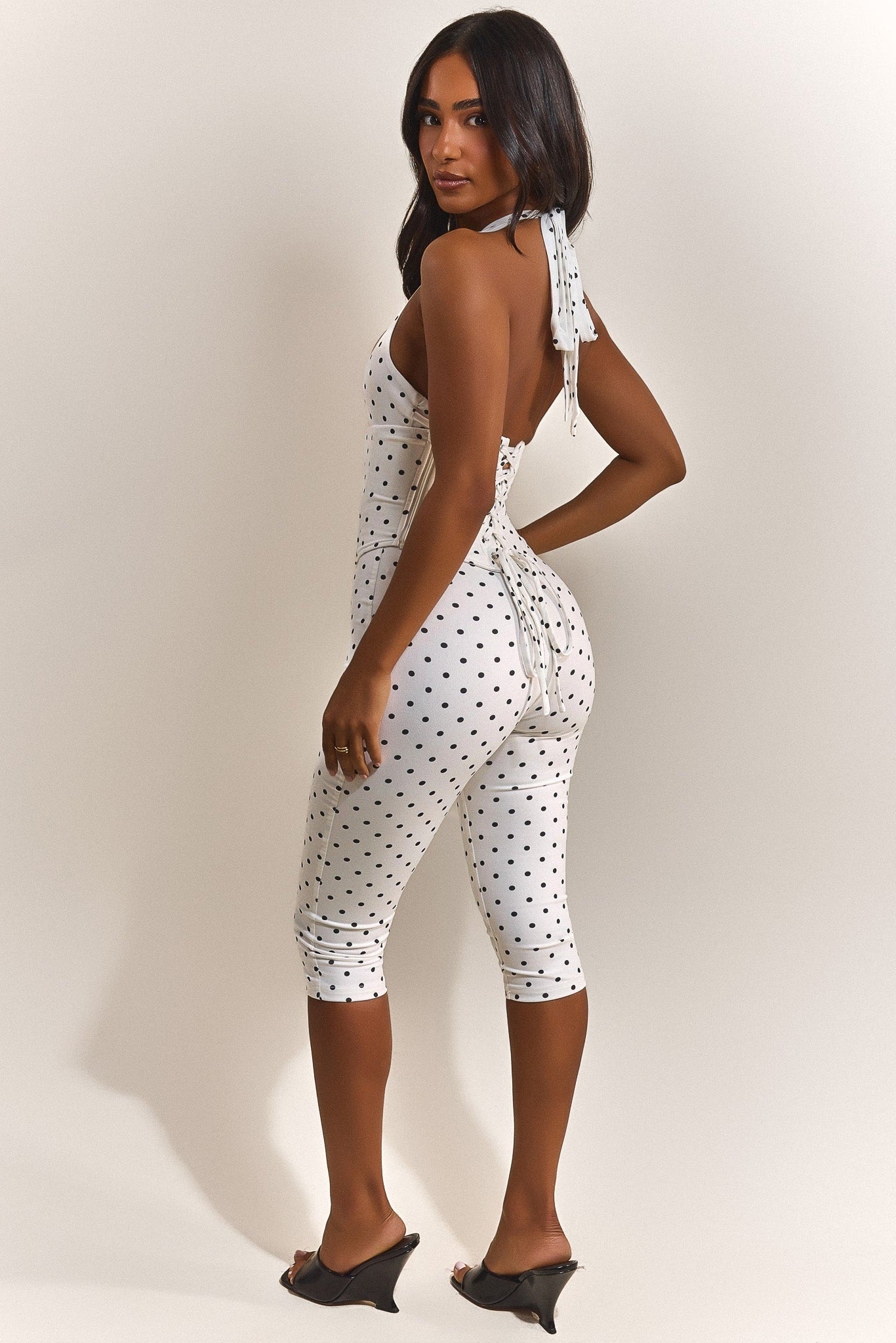 The Sandra Capri Jumpsuit in Polka Dot