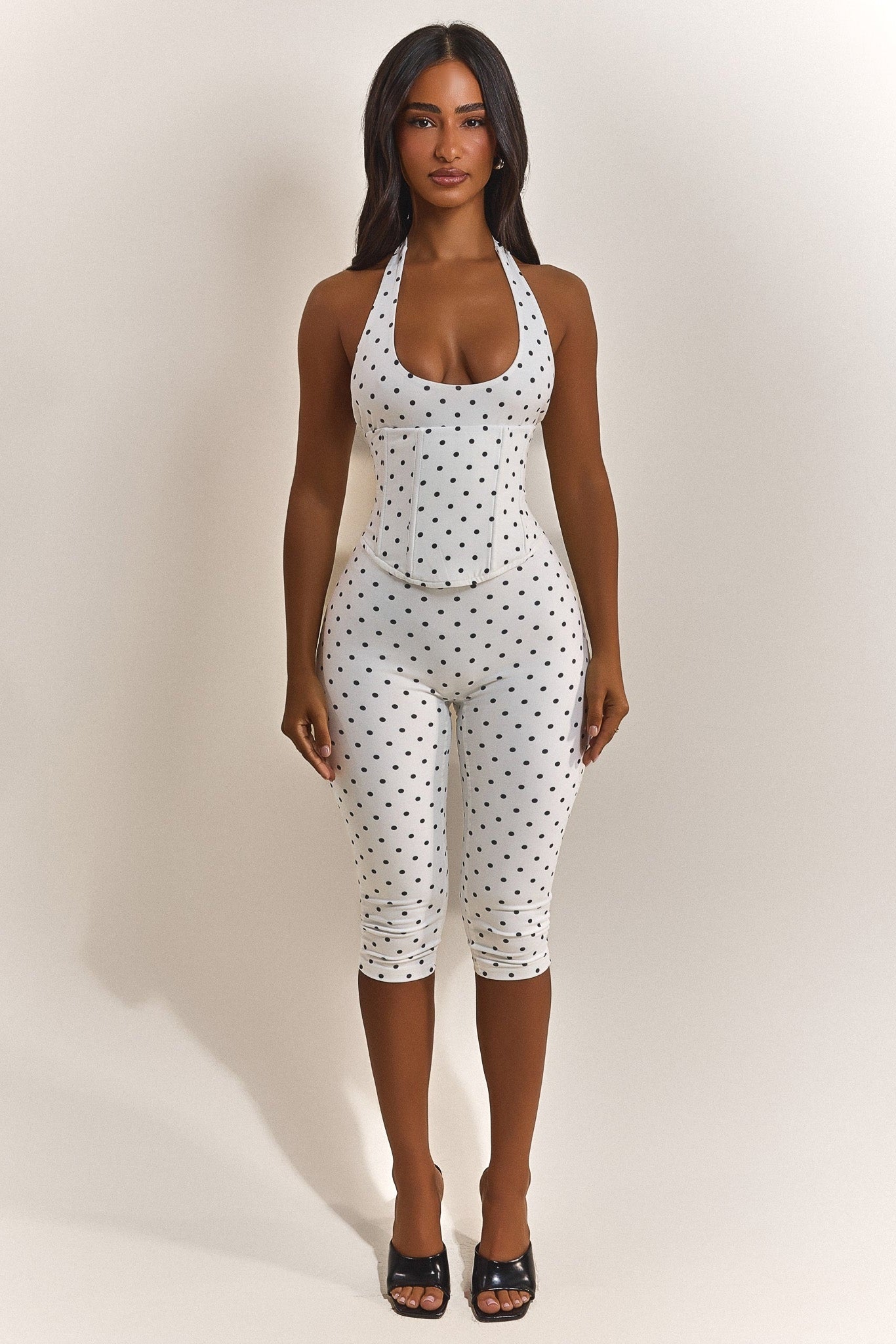 The Sandra Capri Jumpsuit in Polka Dot
